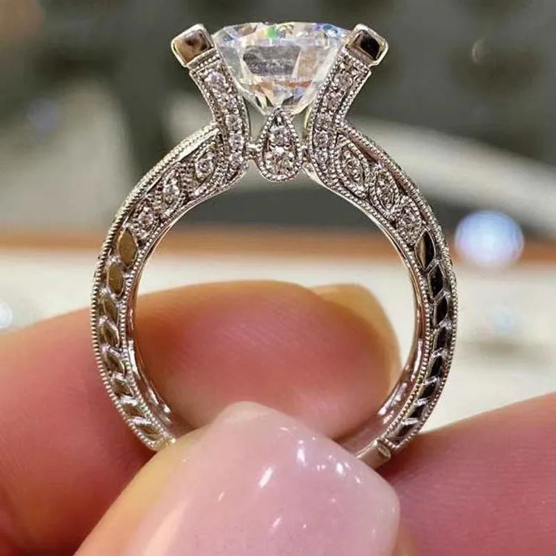 Silver alloy geometric women's engagement ring with round elements in gold or white electroplated finish