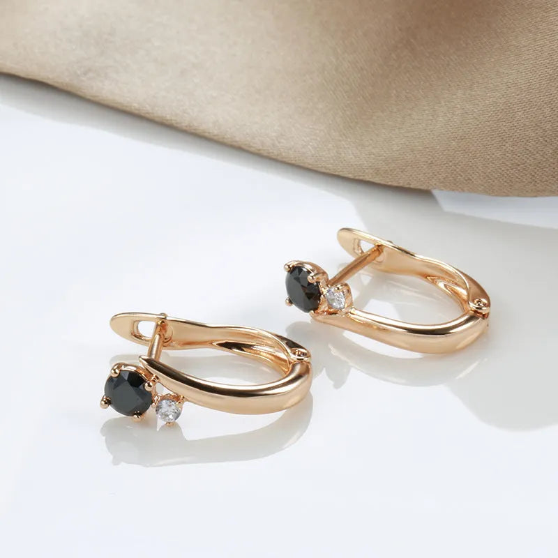 Gold geometric black agate drop earrings with retro design and ear clip fastening