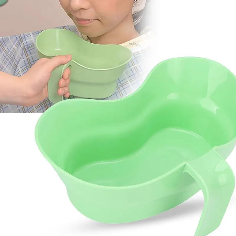 Green plastic gargle cup with spout for bedridden patient oral care