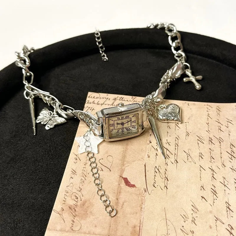 Dark multi-layer cross necklace with twin clavicle chains and hemp flower chain details