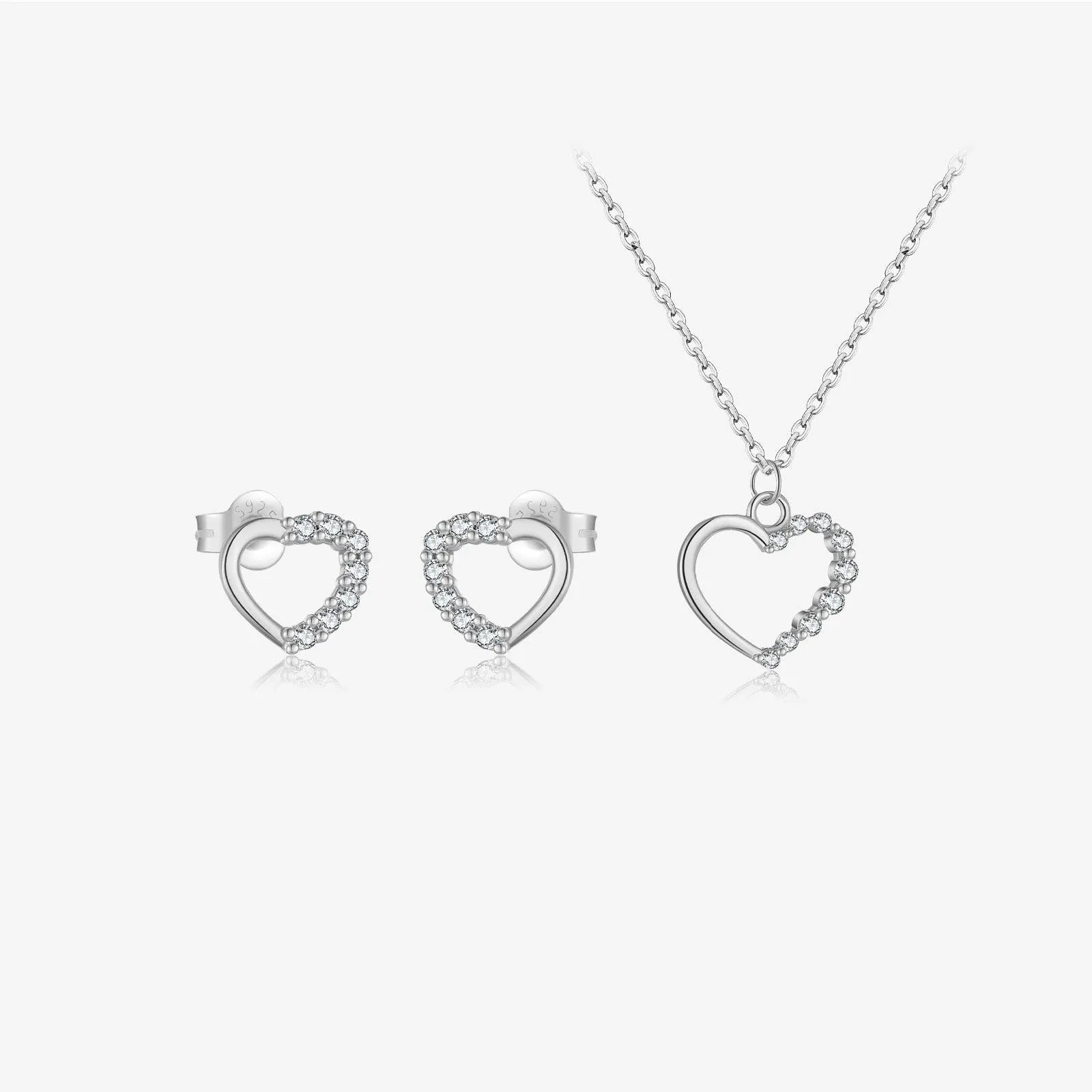 Close-up of a sterling silver hollow heart pendant necklace on a regular chain.