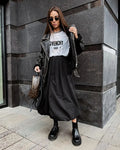 Women's solid colour cotton long skirt with elastic waistband in white or black