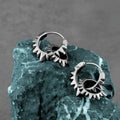Pair of stainless steel round hoop earrings with polished steel finish, retro European American style