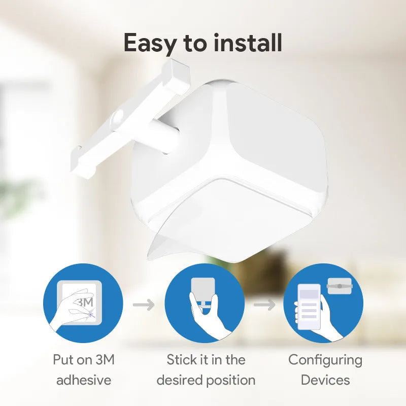 Small white Bluetooth rocker arm remote control on a surface, showing its compact size.