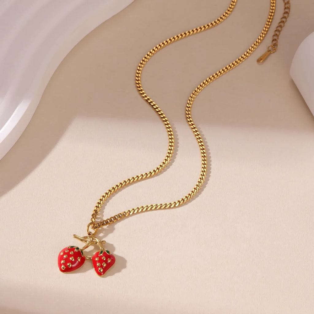 Stainless steel strawberry pendant necklace in red or white powder gradient colour options for women