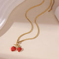 Stainless steel strawberry pendant necklace in red or white powder gradient colour options for women