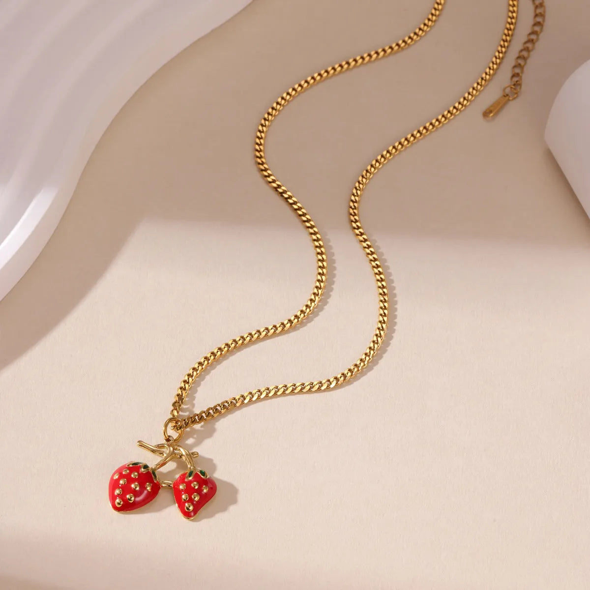Stainless steel strawberry pendant necklace in red or white powder gradient colour options for women