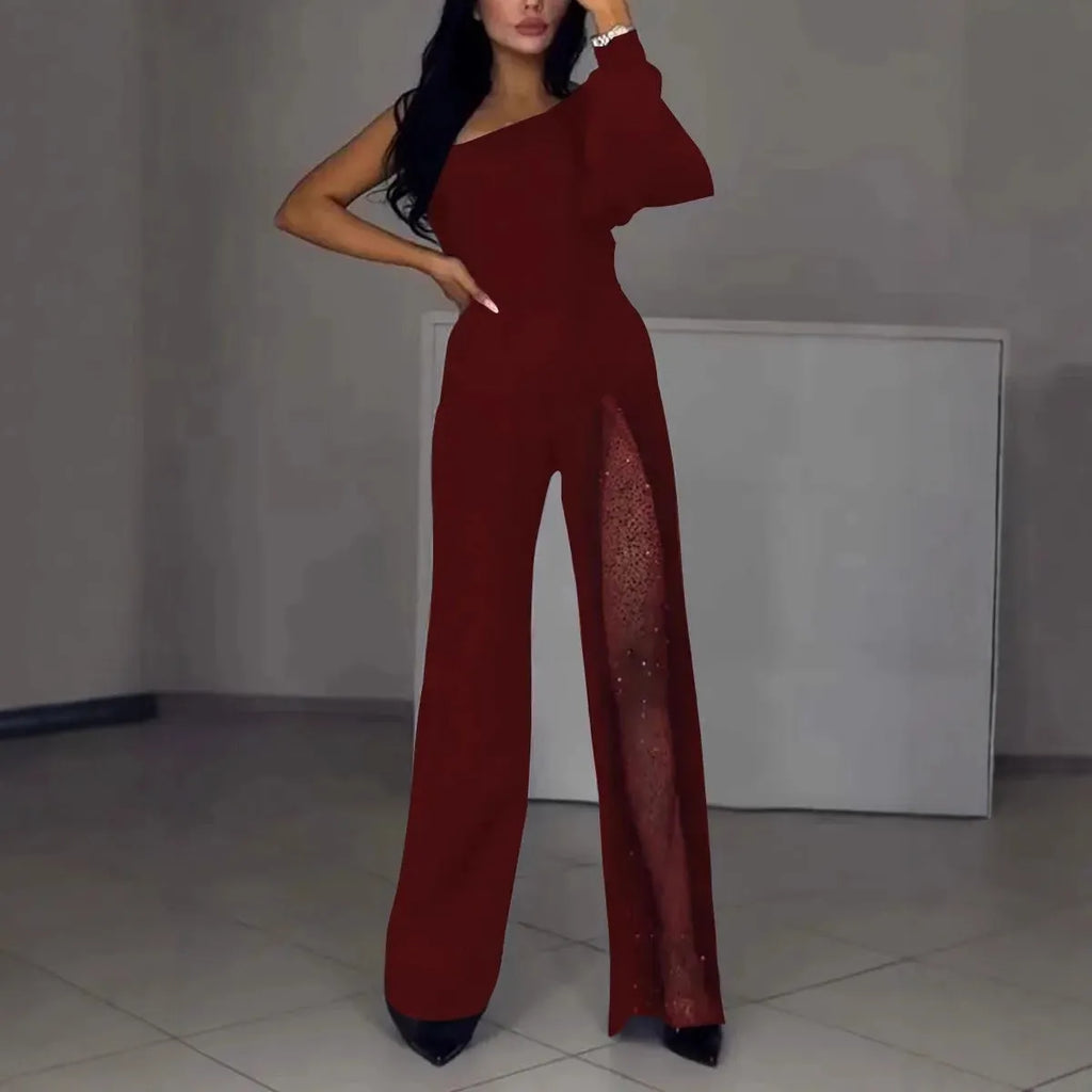 Women's black oblique shoulder jumpsuit with thigh slit and long sleeves for fall winter fashion