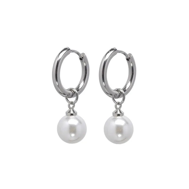 Pair of women's geometric pearl earrings with alloy construction and titanium steel posts