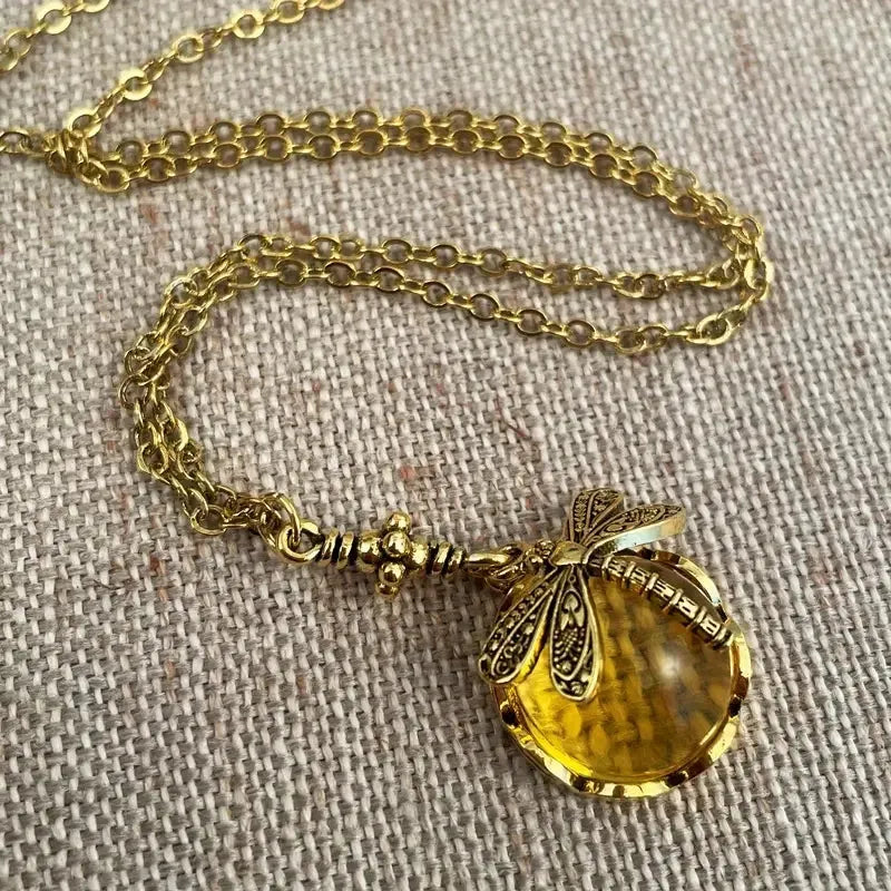 Yellow vintage bronze dragonfly pendant necklace with hand-carved 925 silver detail