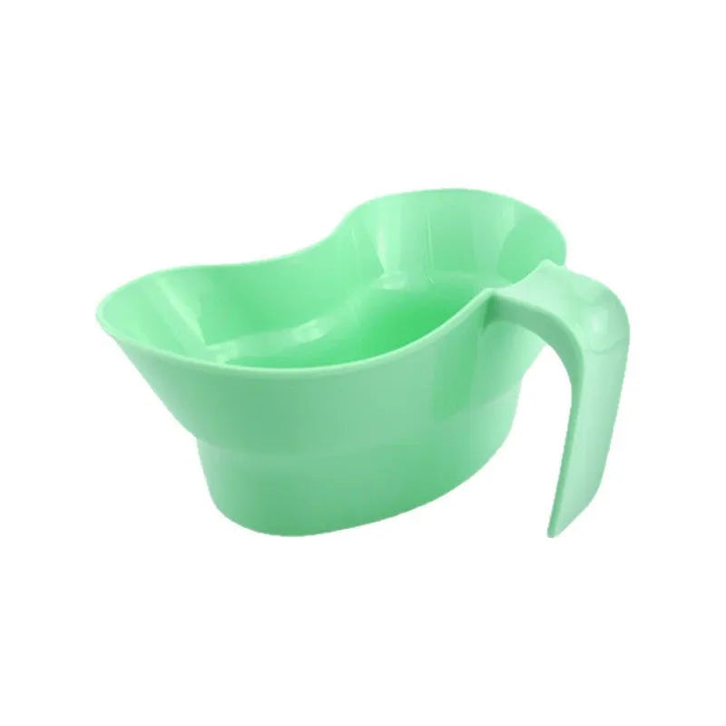 Green plastic gargle cup with spout for bedridden patient oral care