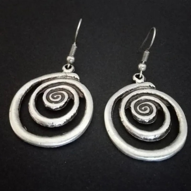 Silver geometric spiral earrings with distressed finish and national style design