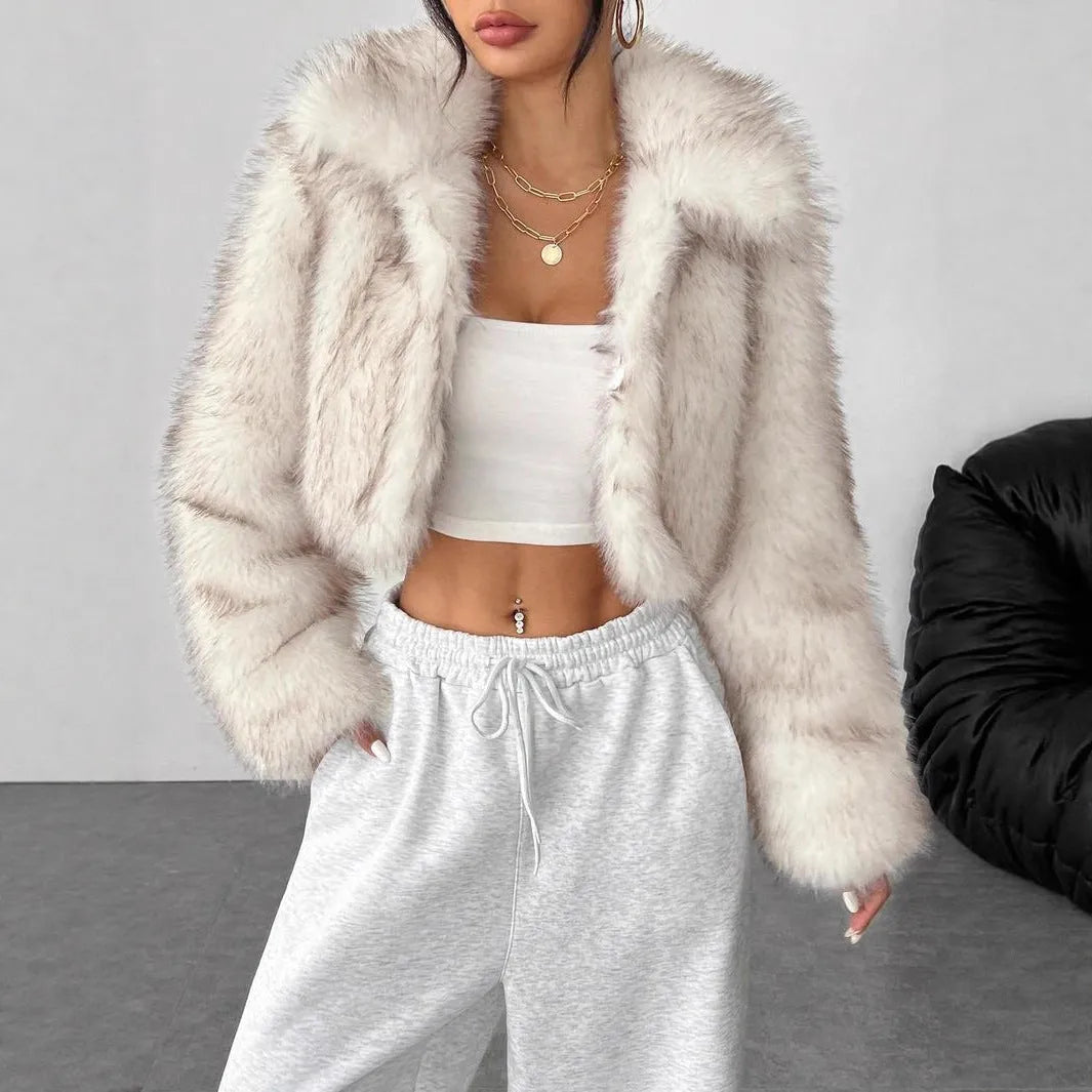 Short black artificial fur coat with a large fur collar, shown on a model.