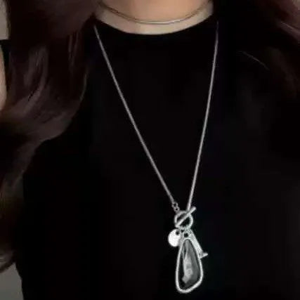 Geometric alloy pendant on snake bone chain necklace in water drop colours