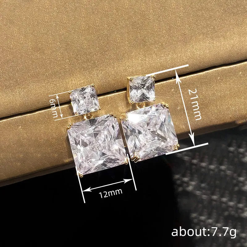 Geometric square design copper earrings with quadrilateral elements in white gold or gold colour