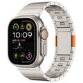 Stainless steel Apple Watch strap with magnetic fold-over buckle in silver colour.