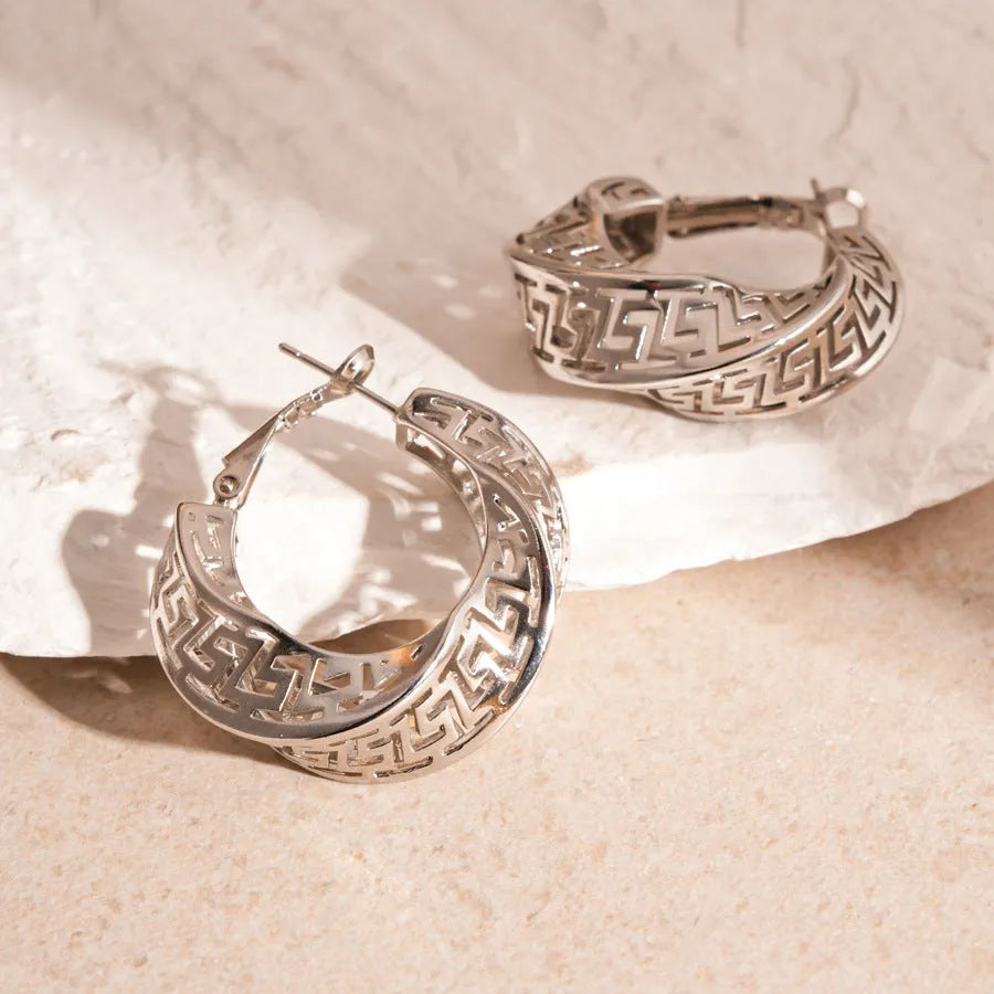 Women's geometric stud earrings with twisted round design in gold and silver electroplated copper