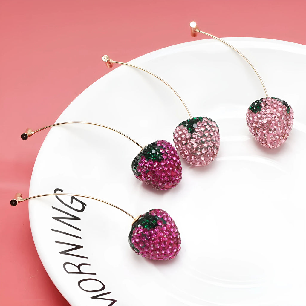 Geometric strawberry-shaped stud earrings with spot drill crystal details in red colour option