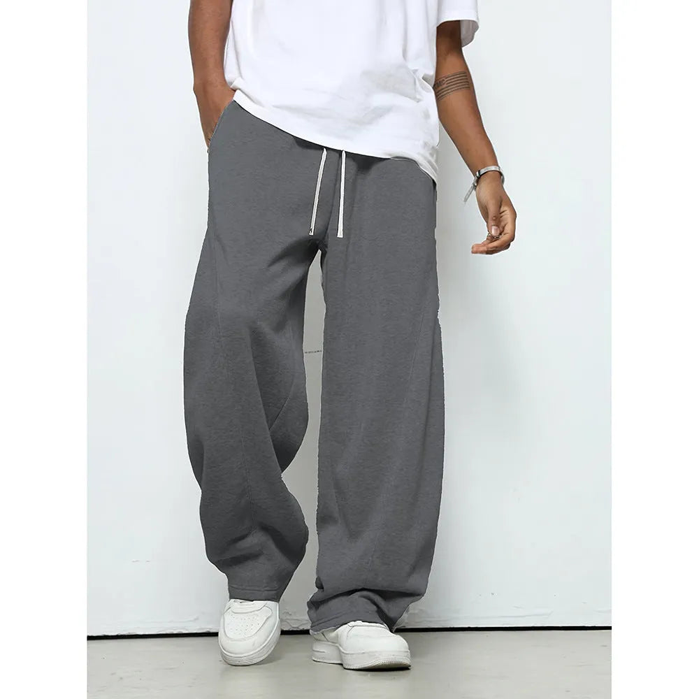 Men's solid colour straight leg casual trousers with a drawstring waistband.