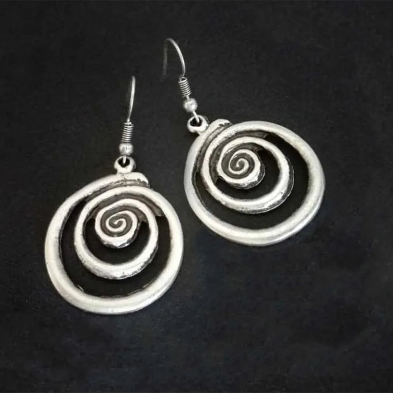 Silver geometric spiral earrings with distressed finish and national style design