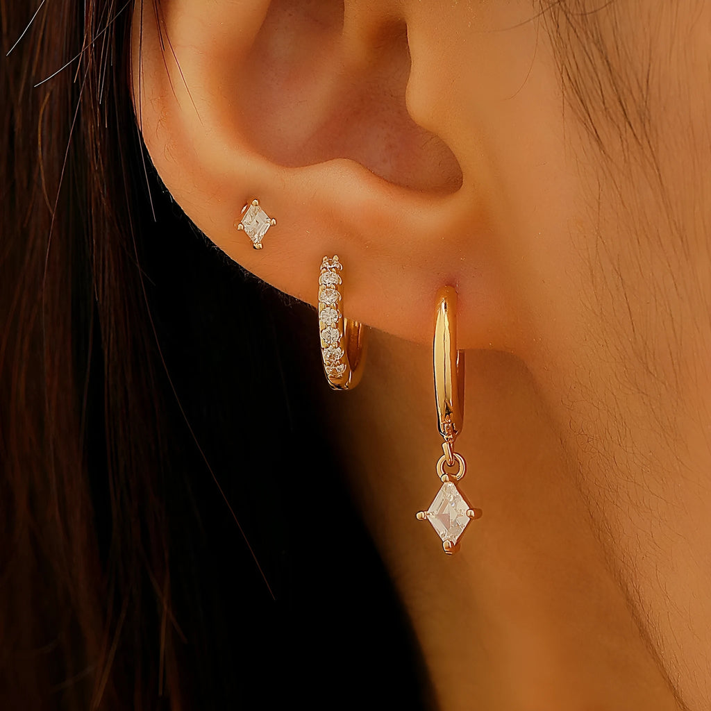 Geometric zircon earring three-piece set showing ear ring, stud, and clasp in gold and silver colours