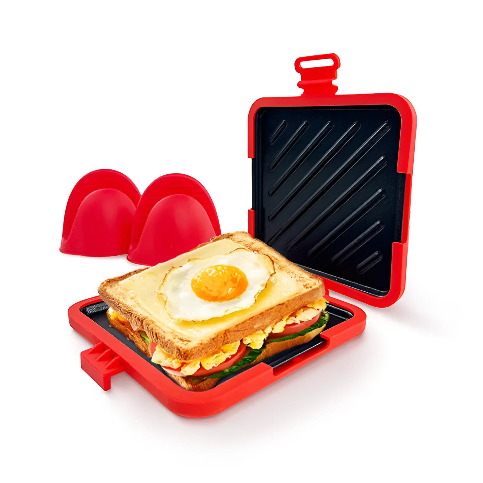 Red silicone baking tray with matching oven gloves on kitchen counter