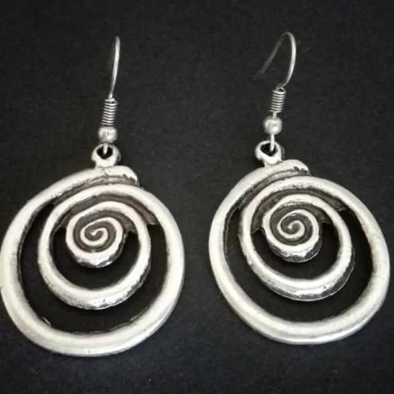 Silver geometric spiral earrings with distressed finish and national style design