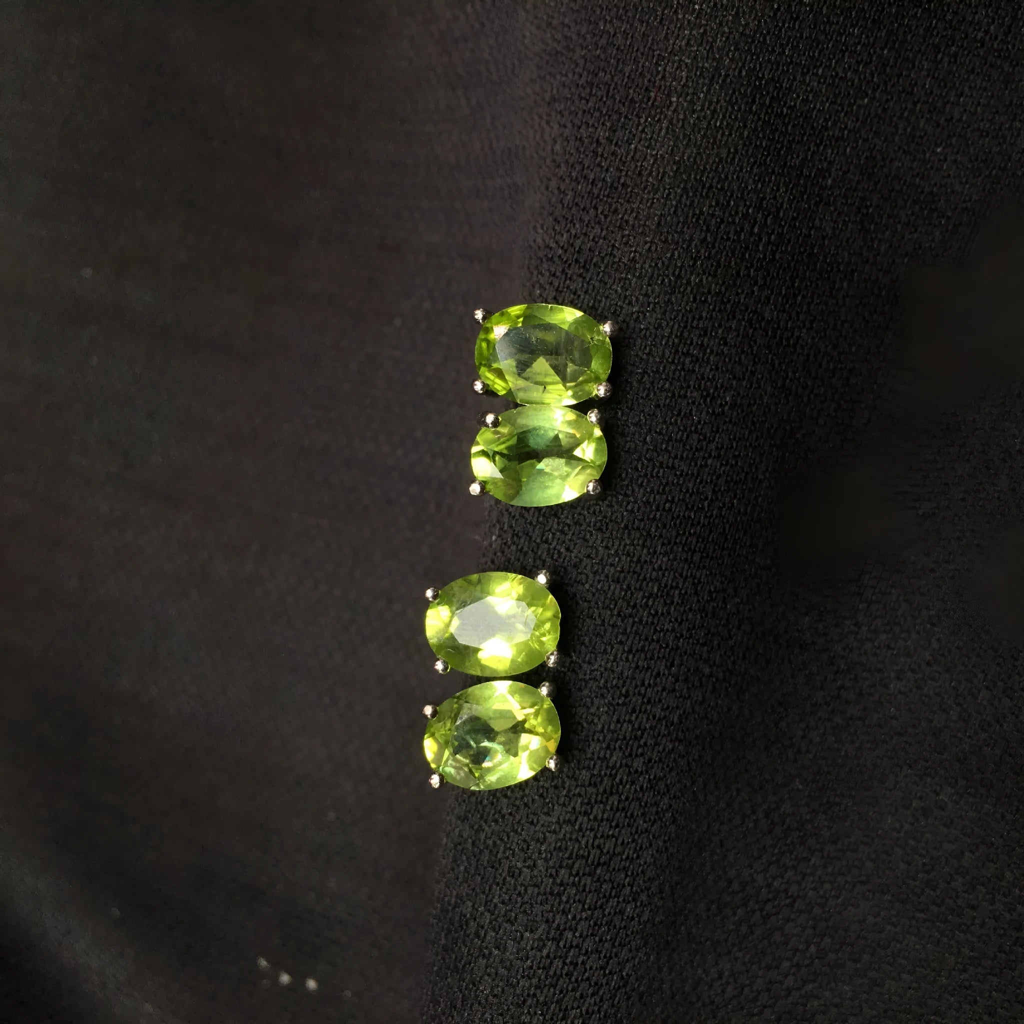 Natural olivine stud earrings in grass green set in S925 silver with 6×8mm oval faceted stone