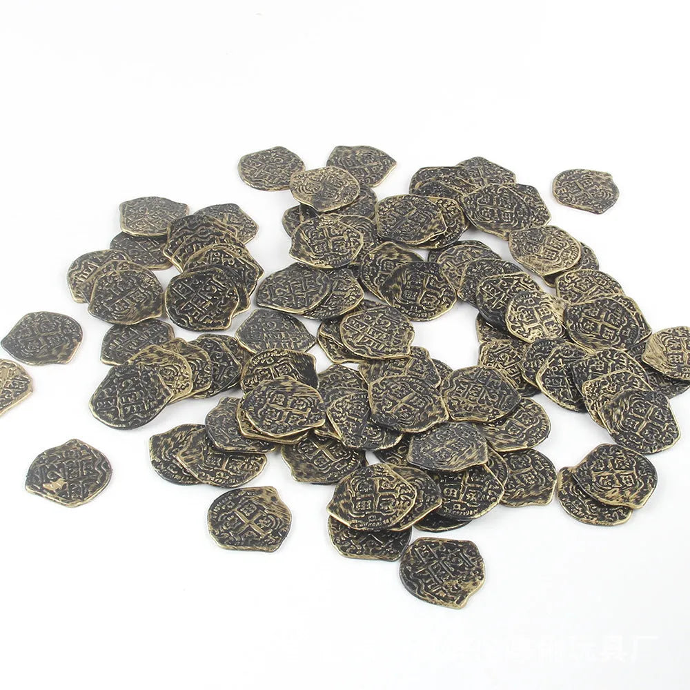 100 plastic Roman coin replicas with metallic bronze, gold, and silver electroplated finishes displayed together.