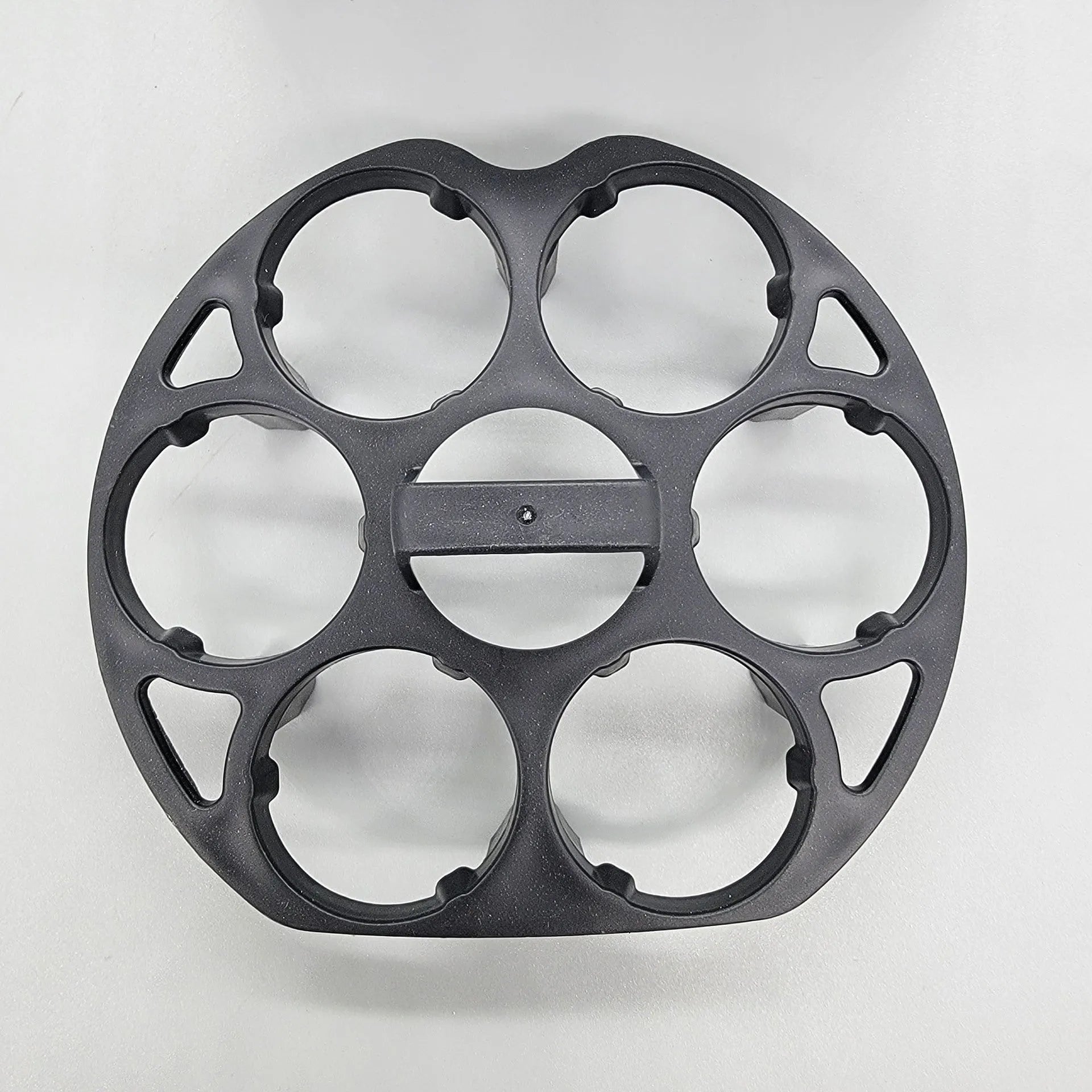 Black plastic egg holder basket for cooking machines measuring 13.8 x 12.6 x 5.7 cm