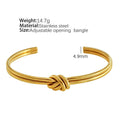 Adjustable open C-shaped double-layer bracelet in gold plating with a knotted design on stainless steel.