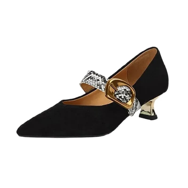 Black women's pointed toe stiletto heels with an ankle buckle fastening on a rubber sole.