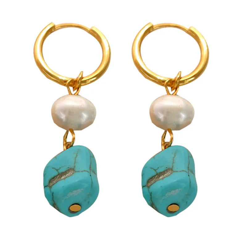 A pair of turquoise and cultured pearl clip-on earrings with irregular geometric copper shapes, showing both long and short styles.