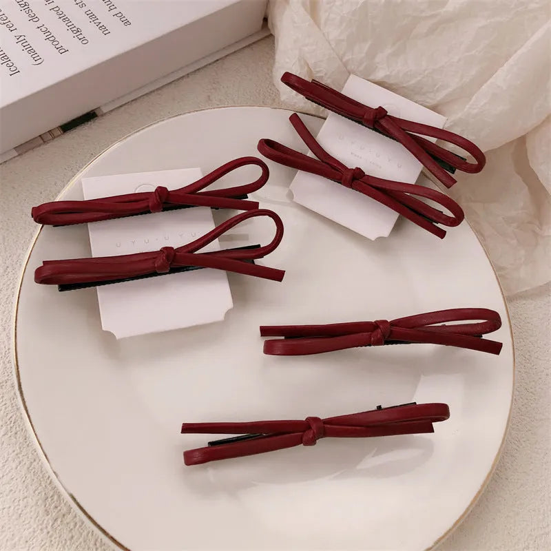 Wine red leather bow hair barrettes with manual processing and advanced styling for women