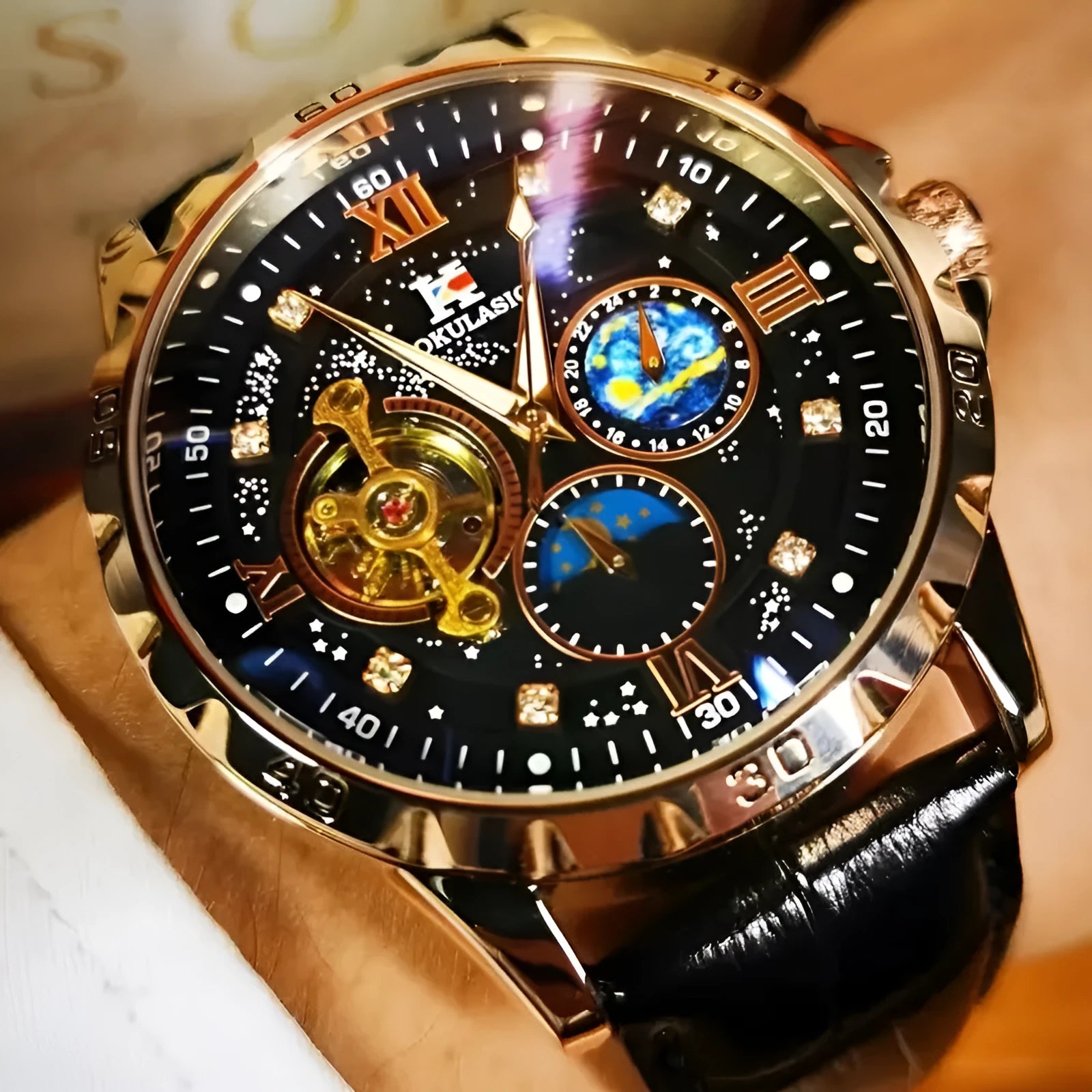 Men's rose gold skeleton automatic watch with black leather strap showing mechanical movement