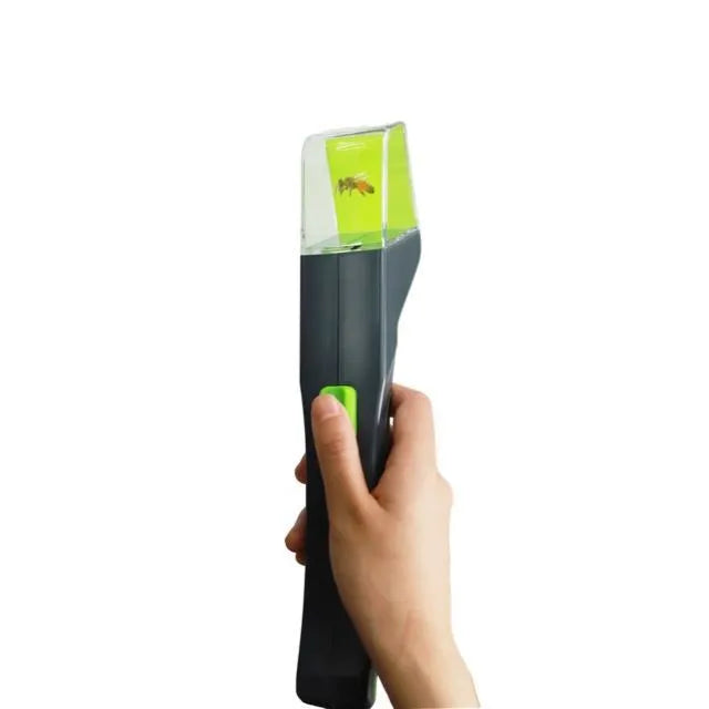 Green handheld plastic insect catcher for garden and grass pest control