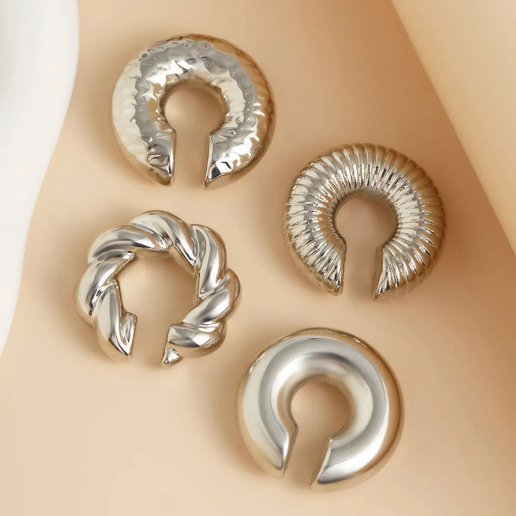 Geometric clip-on earrings set with four pieces in gold or silver colours, ins-style design