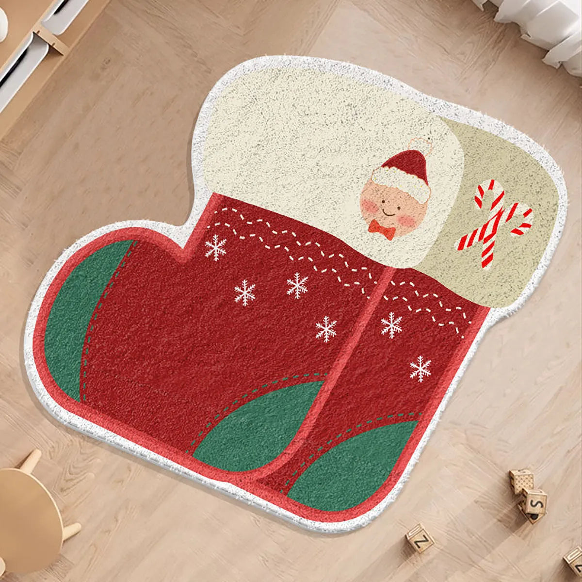 Round Christmas floor mat in imitation cashmere with festive designs including gingerbread men and Christmas trees
