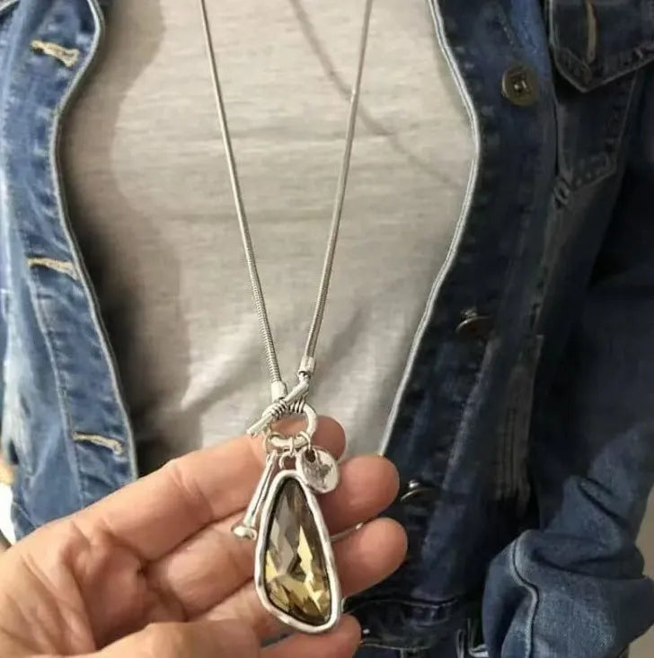Geometric alloy pendant on snake bone chain necklace in water drop colours