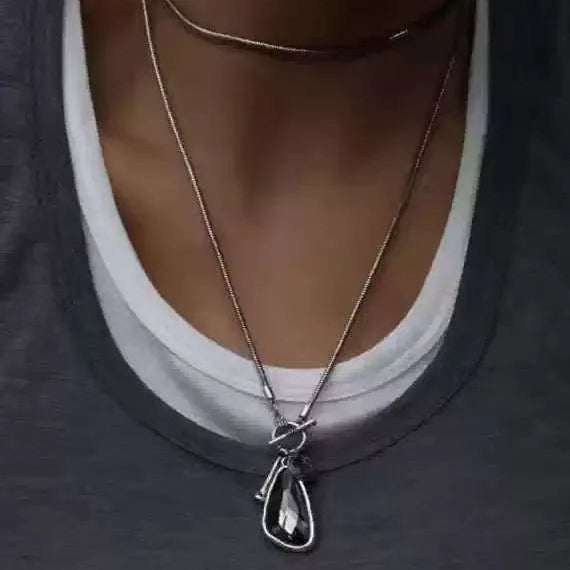 Geometric alloy pendant on snake bone chain necklace in water drop colours
