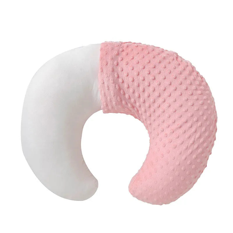 Multifunctional nursing pillow in light blue colour for breastfeeding support and spill prevention.