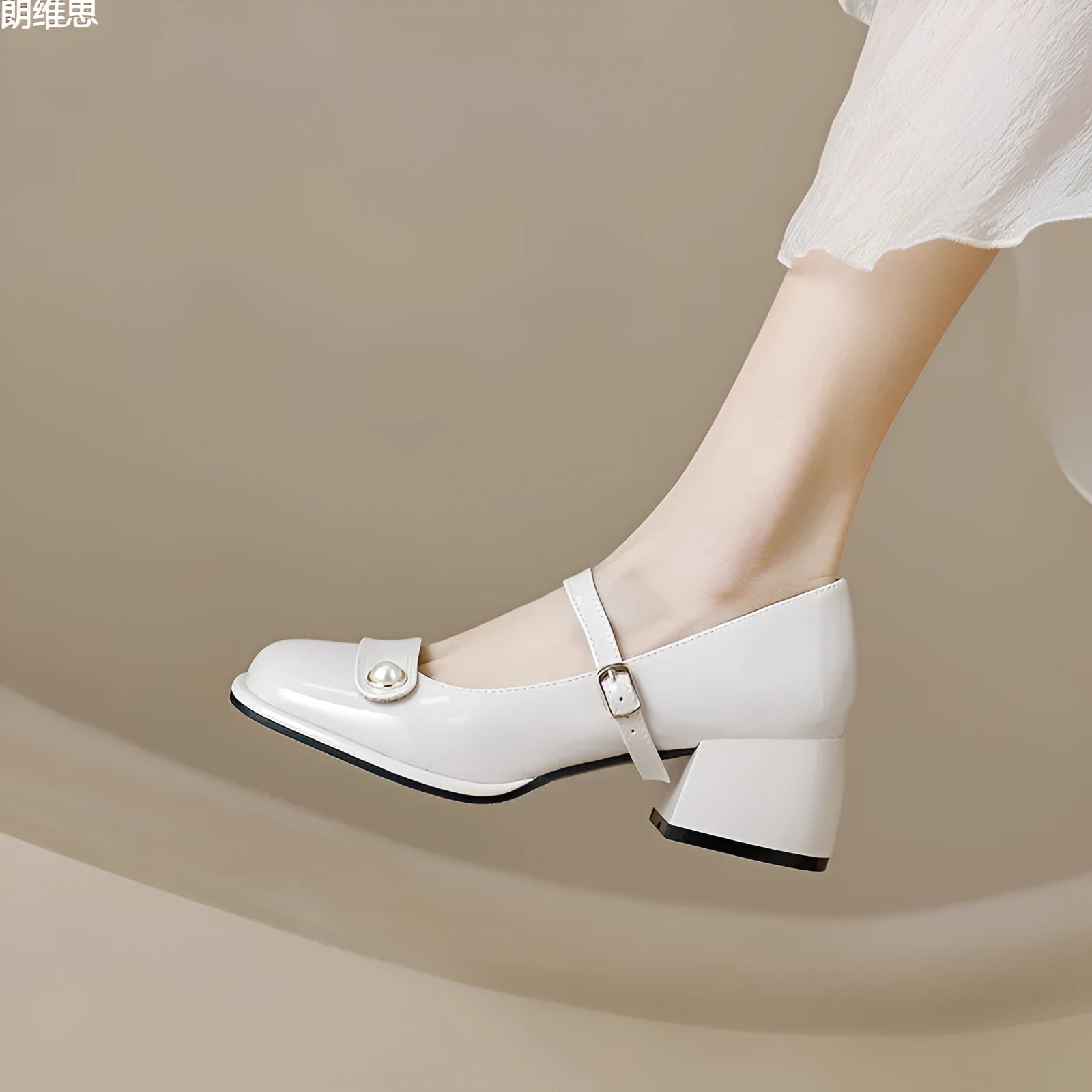 Women's apricot patent leather chunky heel pumps with a square toe and silver buckle fastening.