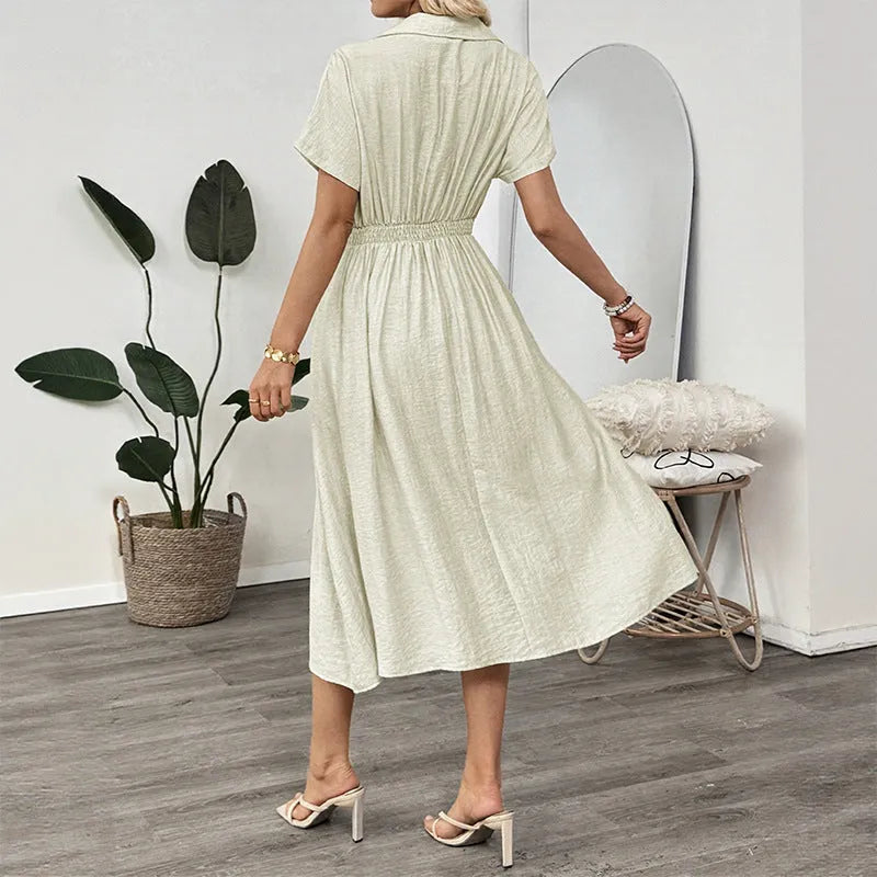 Light green women's shirt dress with lapel collar, defined waist, and pockets on a model.