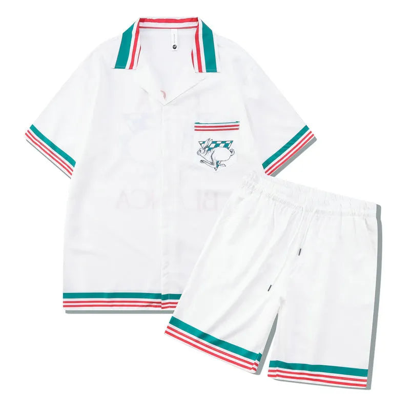 Plaid pattern beach outfit set with short sleeve shirt and matching shorts on mannequin