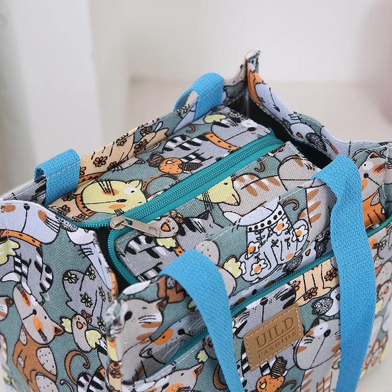 Women's printed canvas tote bag with aluminium frame in a square shape, showing floral and typographic design options.