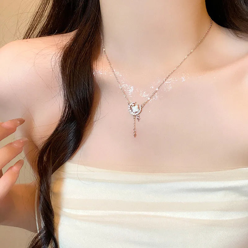 Gold and silver star moon sparkling zirconium necklace on an adjustable copper chain for women.
