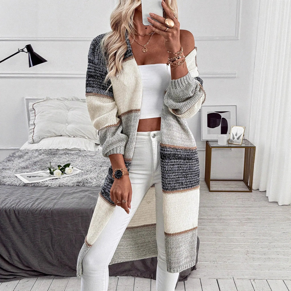 Grey women's knitted cardigan with loose street fashion styling and long sleeves