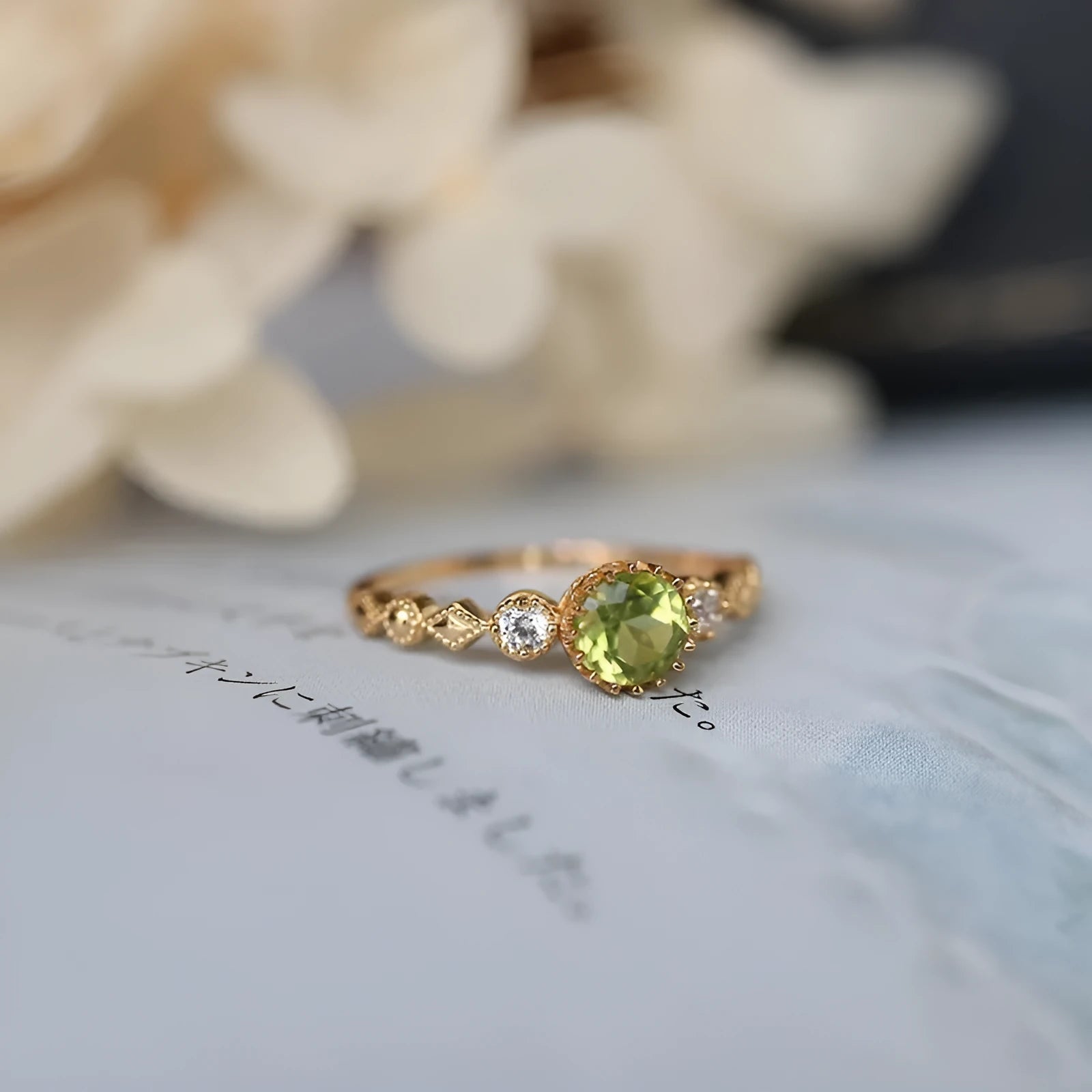 Japanese style geometric copper ring with imitation peridot centrepiece in quadrilateral design