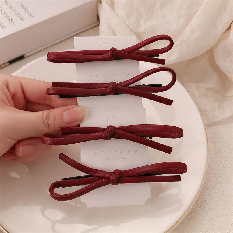 Wine red leather bow hair barrettes with manual processing and advanced styling for women