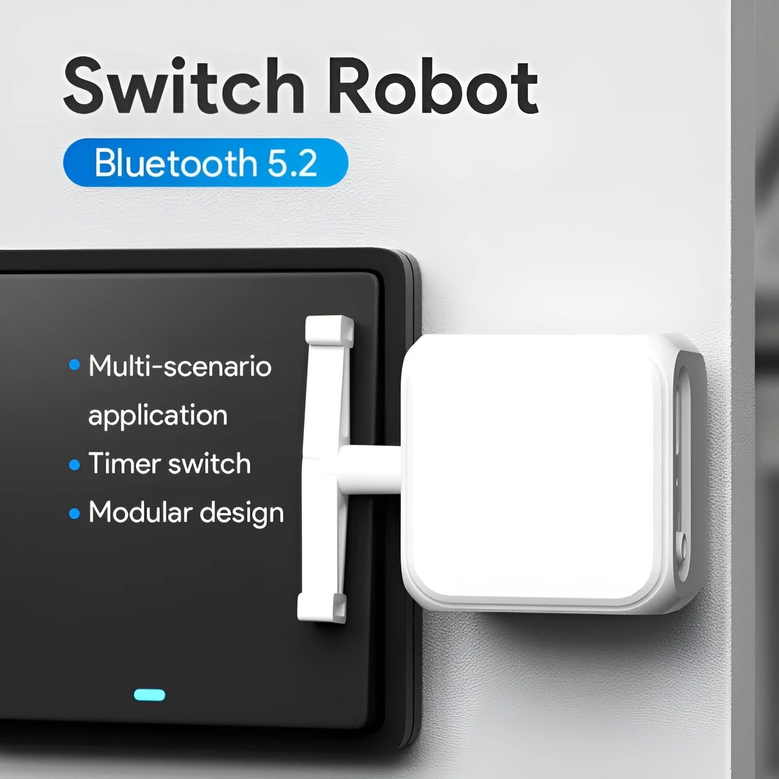 Small white Bluetooth rocker arm remote control on a surface, showing its compact size.